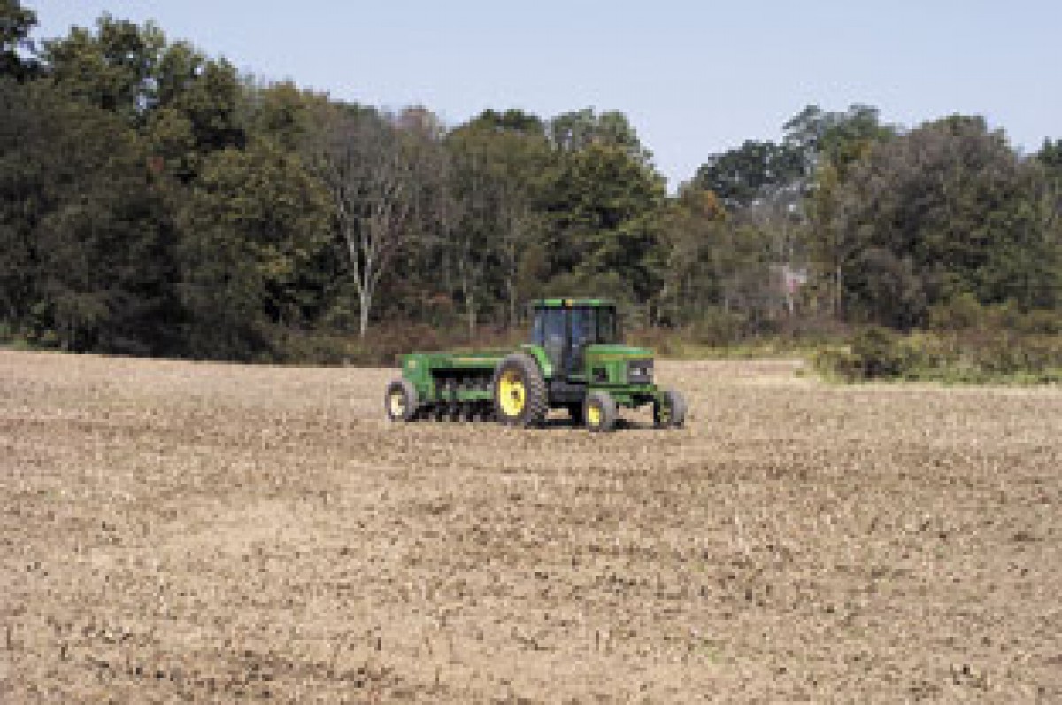 Planting winds down, while trade issues wind up