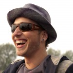 Satire is shaping the next generation laughing young man