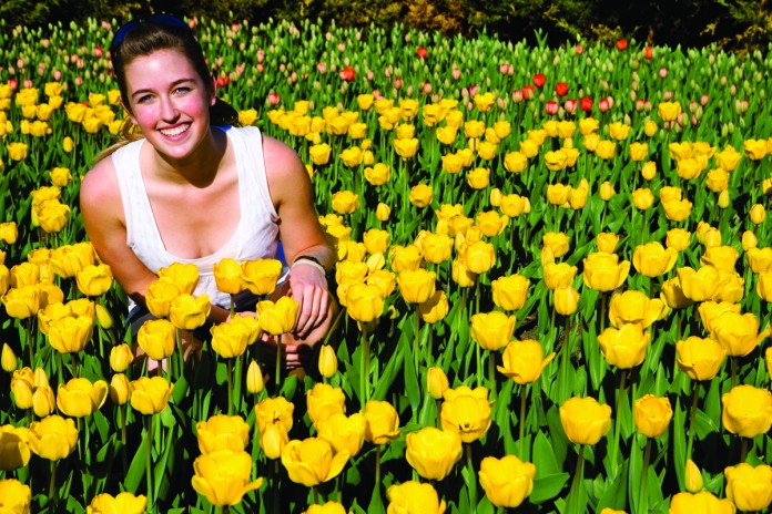 woman in yellow flowers