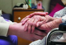 Hospice and palliative care choices are critical holding hands