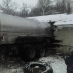 Milk hauling accident damages Belmont County home