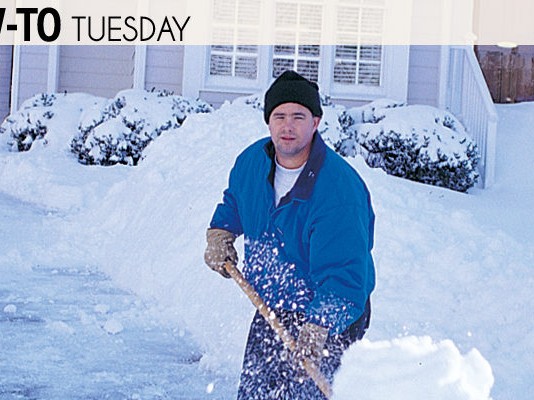 man shoveling snow