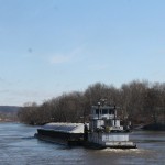 Traffic on the river is moving, but slow