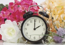 Spring forward to save energy? Not so fast… clock and flowers
