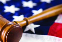 Thirteen states sue EPA, Army Corps of Engineers over definition of waterways flag and gavel