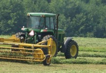 Most of Pennsylvania farmland owned by nonfarmers raking hay