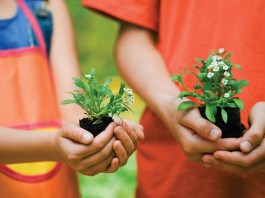 6 ideas for gardening with kids kids holding flowers