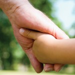 Guerilla parenting holding hands