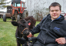 Teen overcomes disability to continue farming Austin Yaworsky