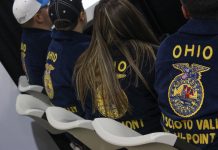 Ohio FFA Convention going virtual for 2021 FFA members sit next to each other in chairs.