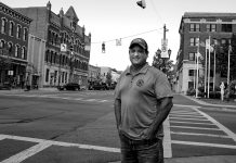 Enough is enough Brent Bennet stands on the corner of a Huron County street