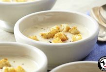 Caraway Cheese Soup Bowls of Caraway Cheese Soup with croutons on top.