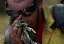 Hot summer temps increase risk of heat illness sweaty, exhausted man