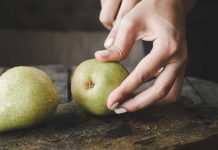 Pear Honey woman cutting pears