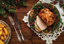 Herbed Turkey Breast Herbed Turkey Breast on a serving platter with decorations