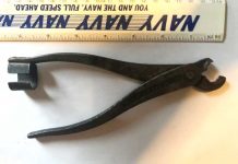 Do you know what this Hazard mystery tool is? Metal plyer like item with a c-shaped piece on the end of one of the arms and curved pinchers that do not sit flat together.