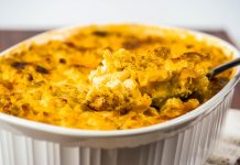 Macaroni and Cheese A white casserole dish filled with Macaroni & Cheese