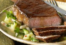 Chinese Five Spice & Maple Glazed Pork Chops Chinese Five Spice & Maple Glazed Pork Chop on a plate with chopped broccoli.