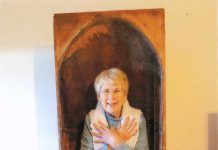 A lighthearted Hazard a Guess, Can you name this antique find? A woman stands inside of a large opening in this antique item.