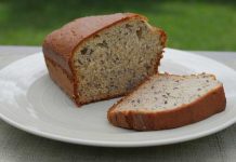 Banana Bread A sliced loaf of Banana Bread on a plate.