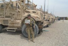 Deployed with Maj. Mark Stepuk Maj. Mark Stepuk in Afghanistan with his Farm and Dairy newspaper