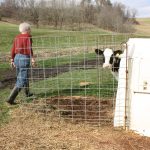 This Mother’s Day, shout out your farm mom A farm mom walking around the farm during a busy day of work.