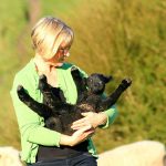 Women-owned ag business expo registration open woman with a goat