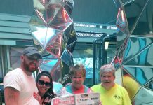 Cruising with the Keenes Janet Keene (holding Farm and Dairy), Lyle Printing commercial printing sales manager, and her husband Randy, of Salem, Ohio, cruised with Janet’s daughter and son-in-law, Chris and Tema Jordan, on the Symphony of the Seas recently. The boat is the largest cruise ship in the world.