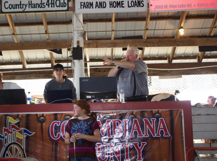 donated hog Madison Cope in sale ring