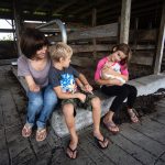 No arm, No problem. Farm accident survivor makes it work julie prentice with children