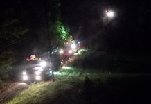 Attitude defines ordeals and adventures bucket trucks coming up Kym Seabolt's driveway