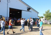 Stark Co. 4-H’ers make the most out of the fair Friends and family congratulate Billy Kegley after he wins beef showman of showmen.