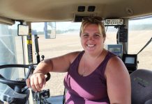 Back to her roots: female farmer takes the lead woman in tractor