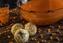 Caramel Popcorn Balls Caramel Popcorn Balls decorated for halloween with plastic spiders