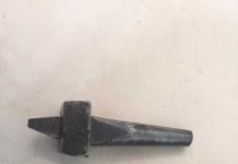 Can you name this spike-like antique tool?