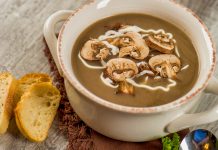 Wild Mushroom Soup A bowl of Wild Mushroom Soup with a side of toasted crostinis.