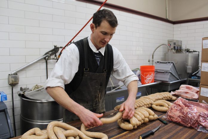 guy making sausage