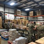 Ohio governor gives nearly $5M to desperate food banks national guard members packing food