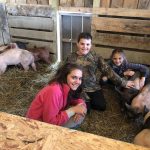 Pa. family dives into county fair preparation, even with unknowns kids with pigs