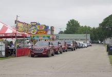 Fairgrounds host concessionaires for fair food drive-thrus Cars line up next to concessionaires' stands at the Canfield Fairgrounds.