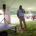 North Carolina farmer shares no-till lessons at summer field day guy standing in front of crowd