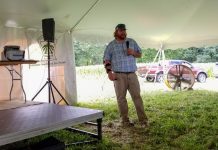 North Carolina farmer shares no-till lessons at summer field day guy standing in front of crowd