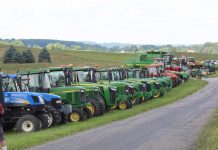 A dairyman, remembered tractors in a line