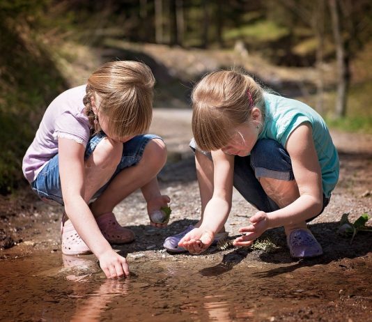 What words of wisdom would you share with your younger self? children playing in a stream