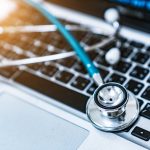 Rural Ohio school district telehealth project could be blueprint for region A stethoscope on a computer keyboard.