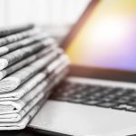 Ohio broadband grant program bill falls through A pile of newspapers on a laptop.