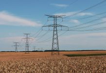 OPSB schedules hearing for proposed solar transmission line in Hancock County High Tension Power Lines Over Field