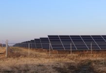 Ohio Power Siting Board approves Highland County solar farm solar panels sit behind a fence