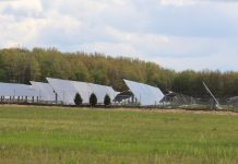 OPSB approves two solar farms solar panels in a field