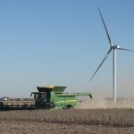 New wind farm becomes operational in Hardin, Logan counties wind turbine and combine